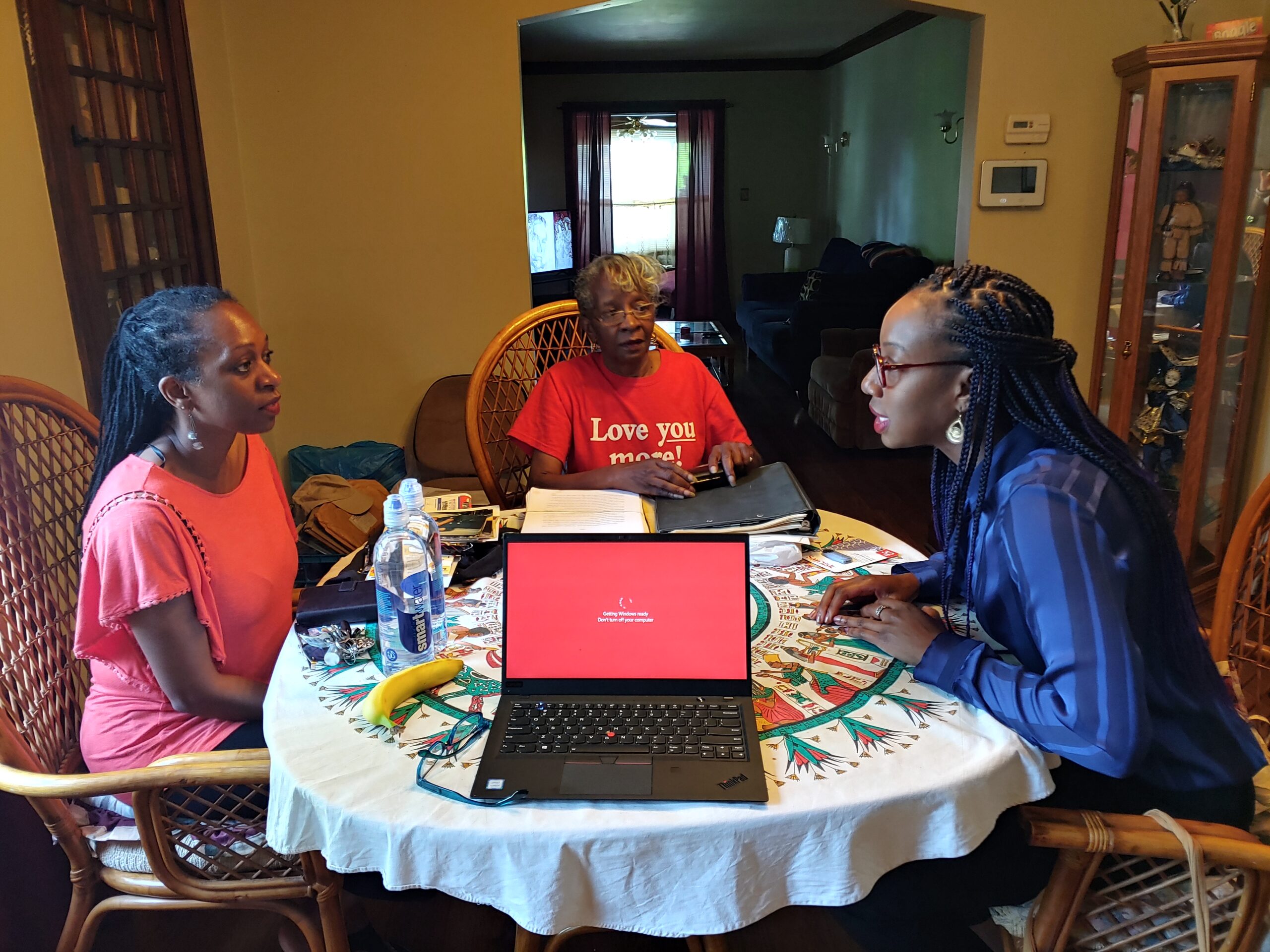 Shalana (left), Linda (center), Steverson (right) engaged in discussion about Delores in 2019. 