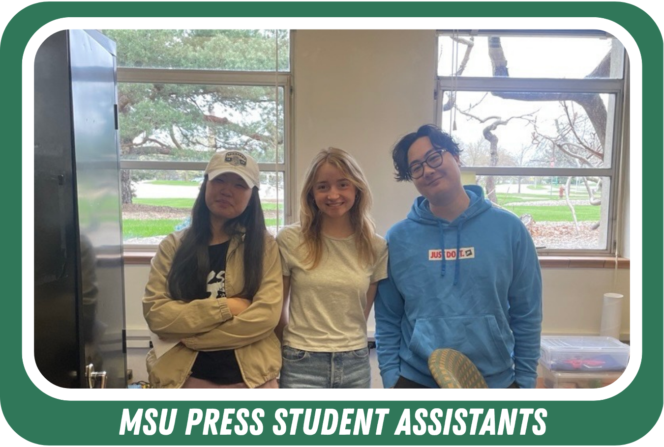 Image of MSU Press student assistants in the office. Caption text is: "MSU press student assistants."