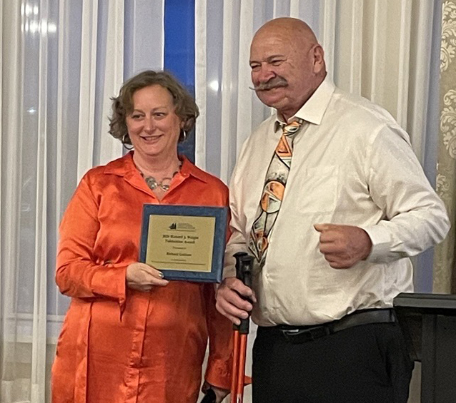 Richard Gebhart accepts 2026 Richard J. Wright Publication Award for his book The Great Lakes Ships of Frank E. Kirby: America’s Greatest Naval Architect. 