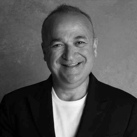 Headshot of author Adrian Woolfson