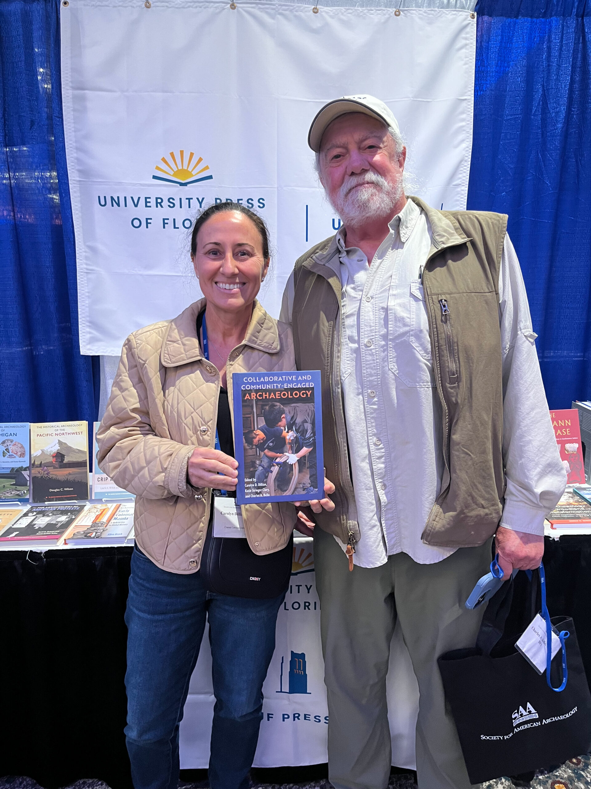 Carolyn Dillian and Charles Bello pose with their book.